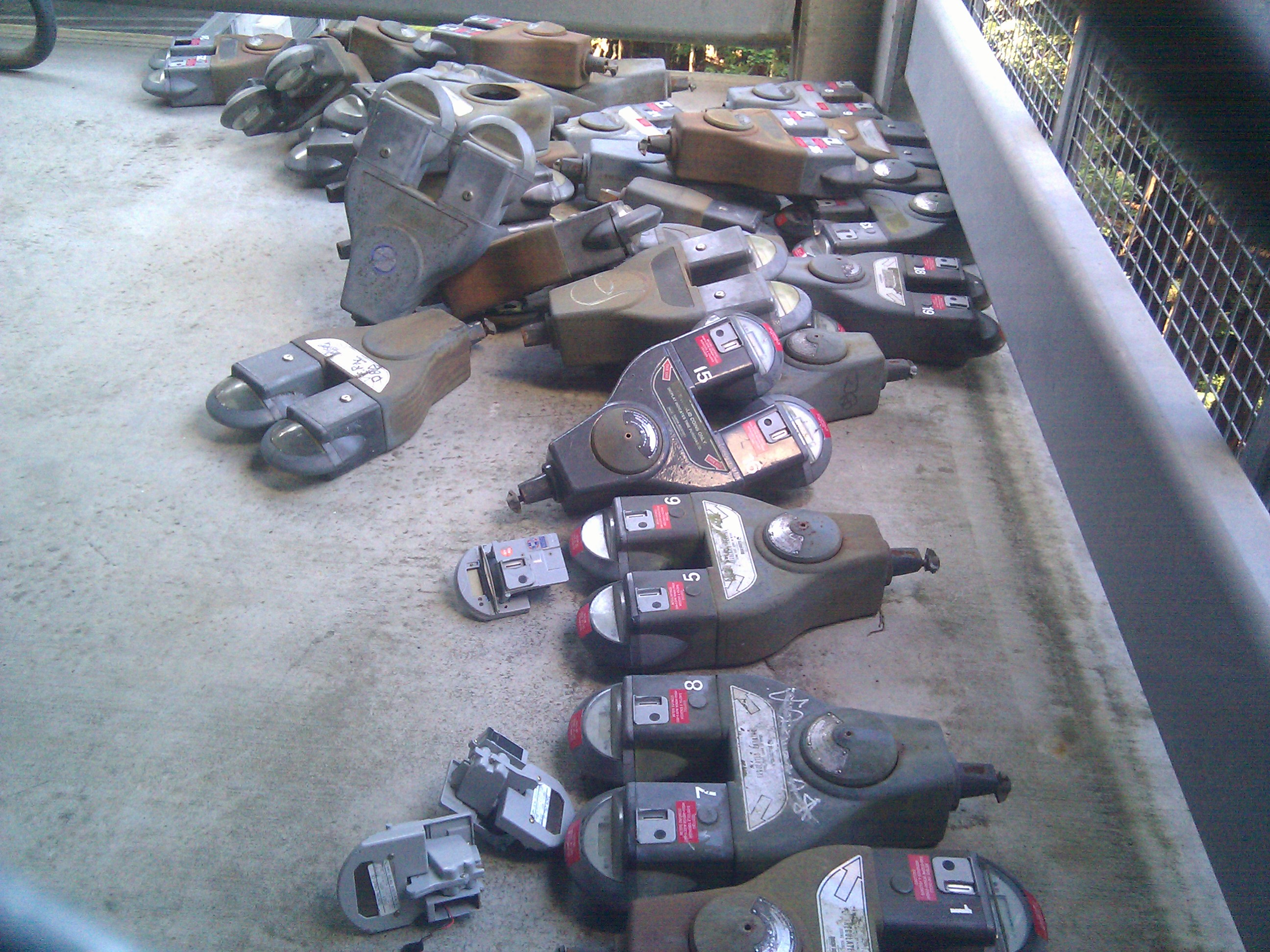 decapitated parking meters, the heads