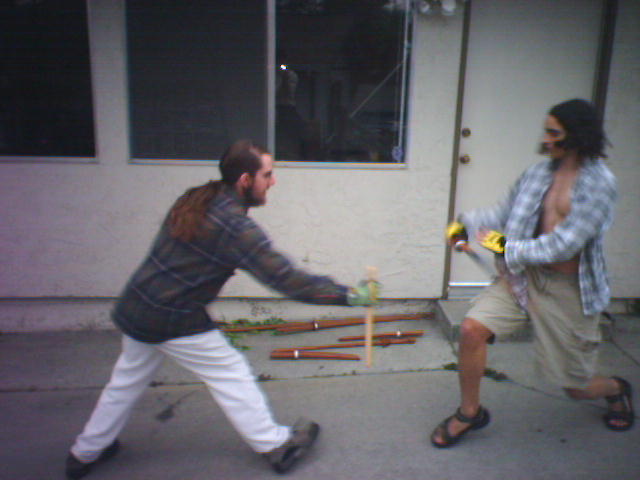 kids downstairs battle in the driveway